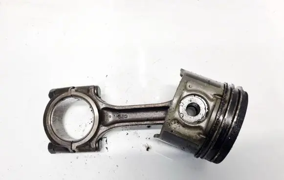 Piston with connecting rod