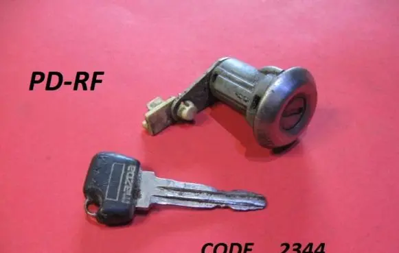 Mazda 626 Front door lock (next to the handle) 2344