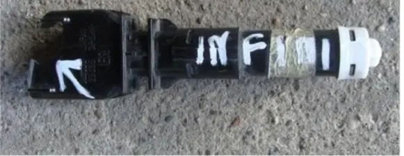 Infiniti M30 Headlight washer spray nozzle