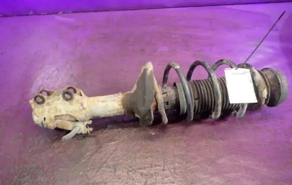 Volkswagen Golf IV Front shock absorber with coil spring