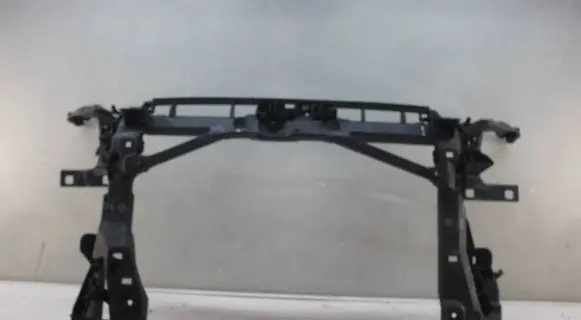 Radiator support slam panel