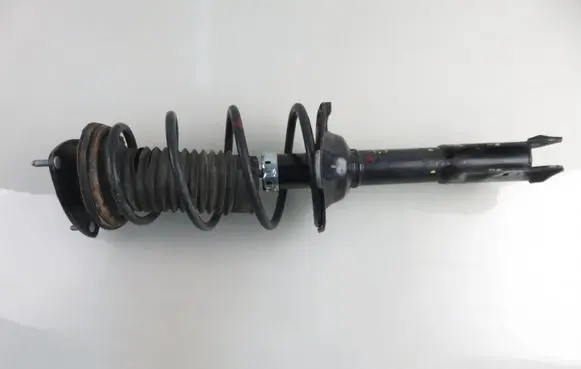 Toyota Yaris Front shock absorber with coil spring 2000199