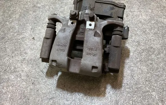 Tesla Model 3 Rear brake caliper A1303 33520