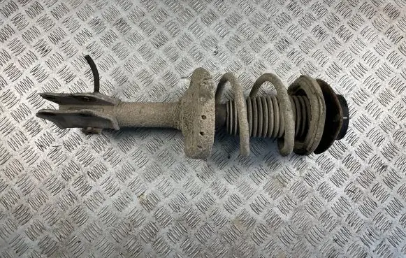 Front shock absorber with coil spring