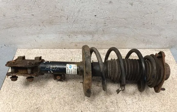 Front shock absorber with coil spring