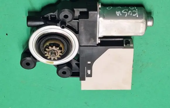 Front door window regulator motor