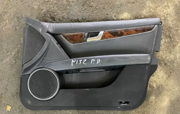 Front door card panel trim
