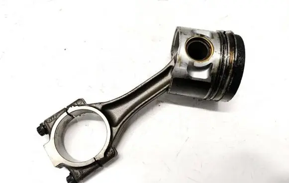 Volkswagen Caddy Piston with connecting rod 038G