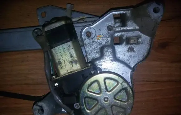 Rear door window regulator motor