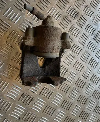 Volkswagen Golf V Front brake caliper