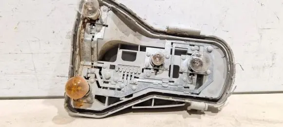 Volkswagen Polo Tail light bulb cover holder 965352