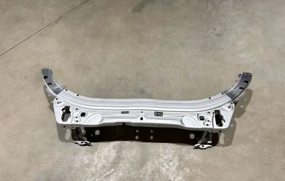 Radiator support slam panel