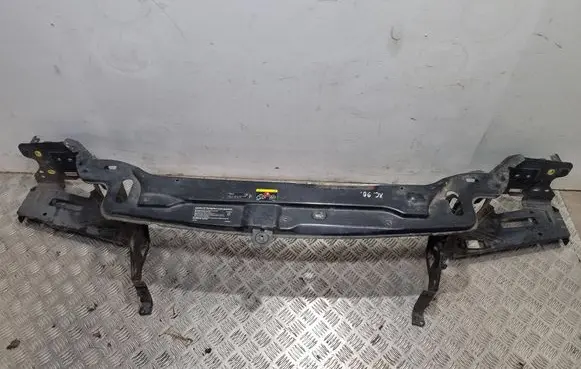 Top upper radiator support slam panel