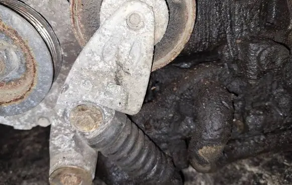 Generator/alternator belt tensioner
