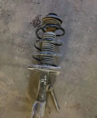 Citroen C4 I Front shock absorber with coil spring