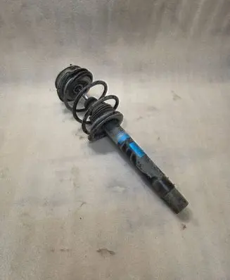 Front shock absorber with coil spring
