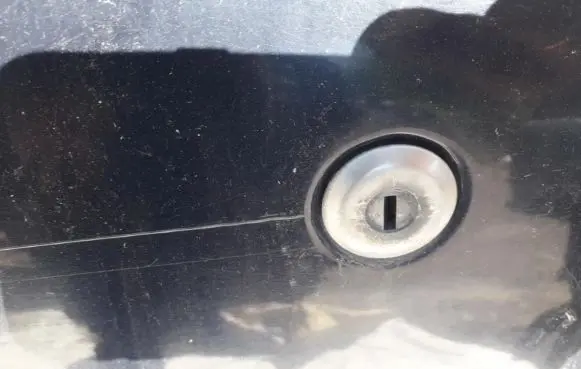 Renault Scenic I Front door lock (next to the handle) 