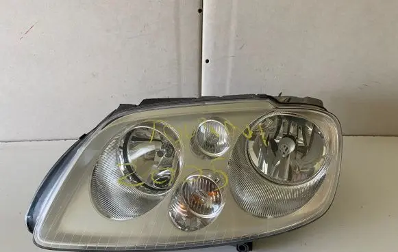 Volkswagen Touran I Headlight/headlamp 1T0941005M 0301205203