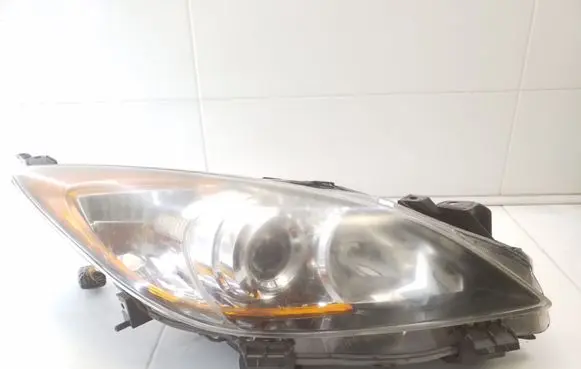 Headlight washer spray nozzle