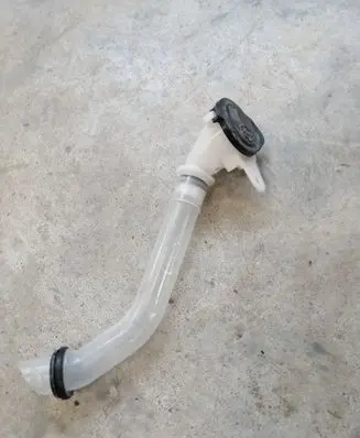 Toyota Yaris XP210 Window washer liquid tank fill tube 