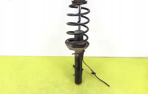 Volkswagen Golf IV Front shock absorber with coil spring