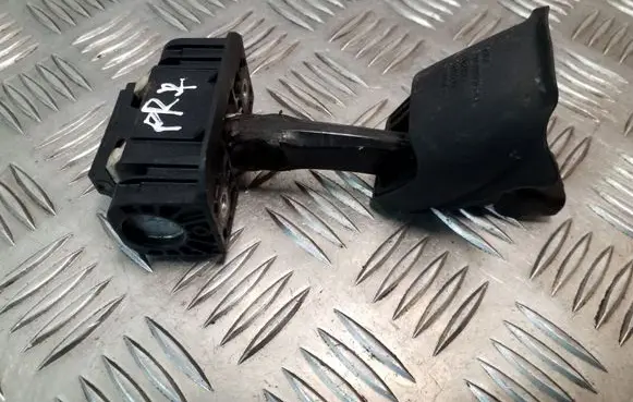 Front door check strap stopper