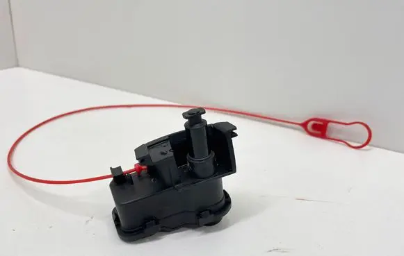 Fuel tank cap lock motor