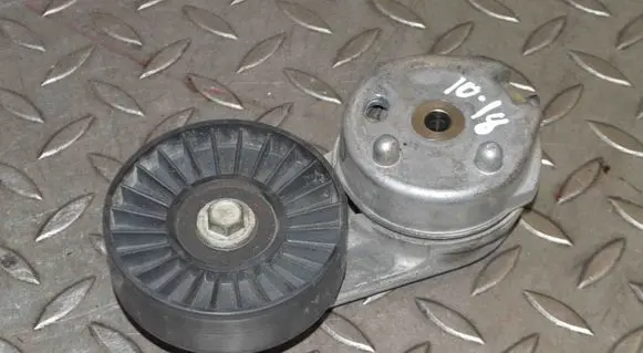 Generator/alternator belt tensioner