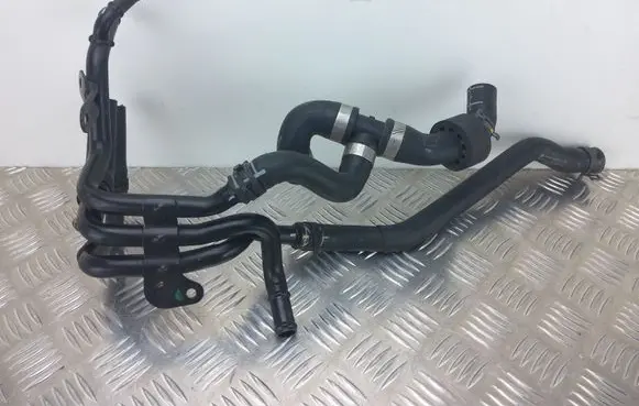 Volkswagen Golf VII Engine coolant pipe/hose 5Q0122101CK 04L121064AF
