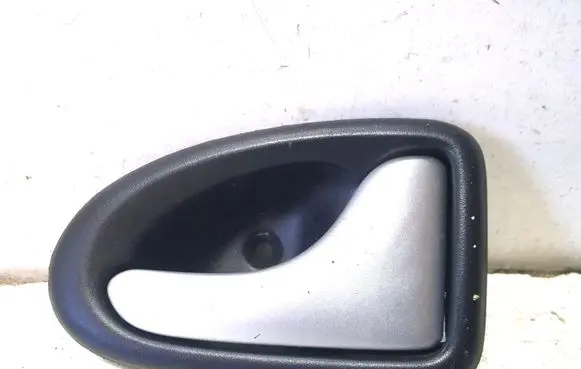 Dacia Logan I Front door interior handle 7700830079