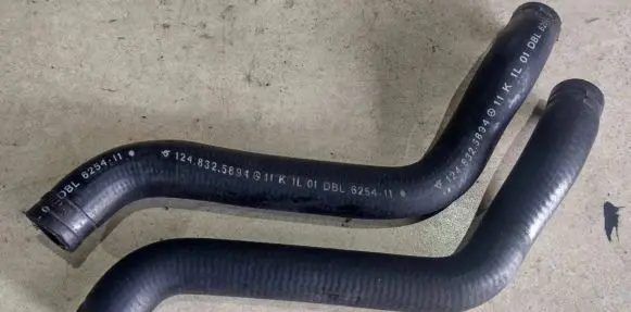 Mercedes-Benz E W124 Engine coolant pipe/hose 1248323094