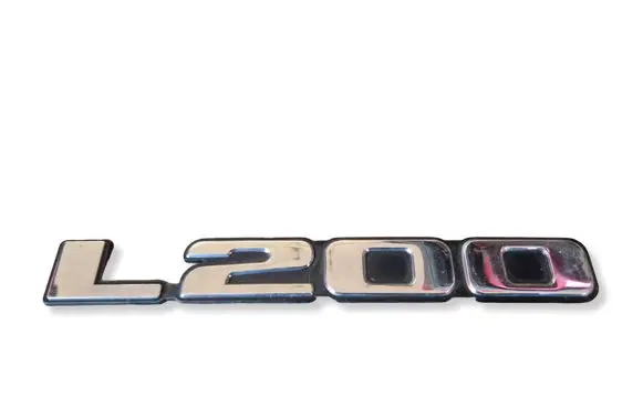 Mitsubishi L200 Front door emblem/model letters 