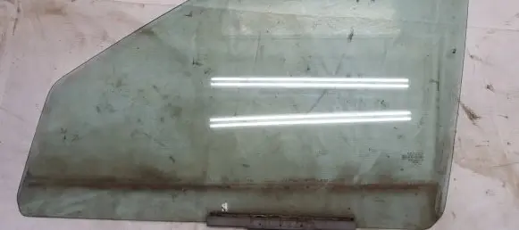 Ford Escort Front door window glass four-door