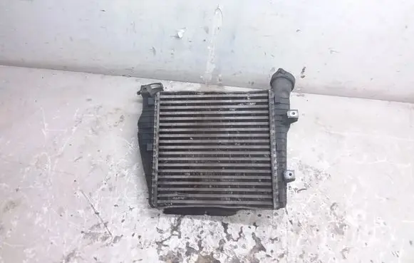 Volkswagen Touareg I Intercooler radiator 7L0117339