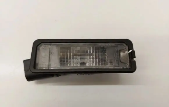 Volkswagen Golf VII Number plate light 1K8943021