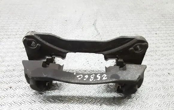 Subaru Legacy Brake caliper pad carrier rear 