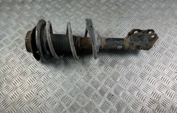 Subaru Impreza III Front shock absorber with coil spring 20310FG050