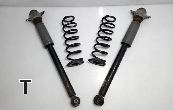 Volkswagen Golf VII Rear shock absorber with coil spring 5Q0511115FG