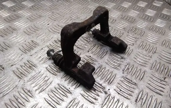 Volkswagen Golf V Brake caliper pad carrier rear 