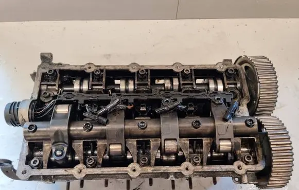 Volkswagen Touran I Engine head 03G103373 A1517MCC005