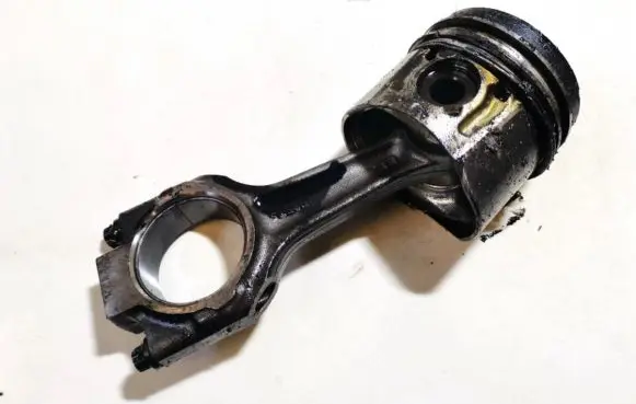 Piston with connecting rod
