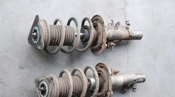Nissan Qashqai Front shock absorber with coil spring XXX 110KM