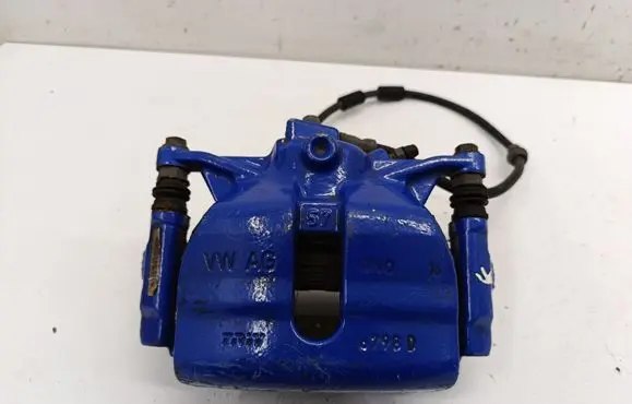 Volkswagen Golf VII Front brake caliper