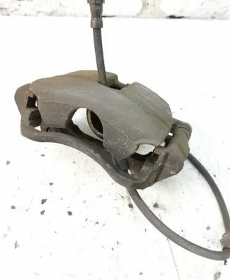 Volkswagen Golf VII Front brake caliper