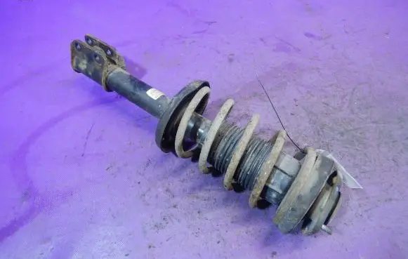 Opel Corsa B Front shock absorber with coil spring 90538711