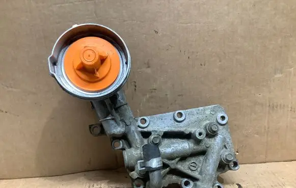 Subaru Legacy Oil filter mounting bracket