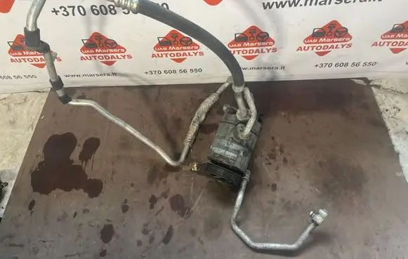Volkswagen Jetta VI Air conditioning (A/C) compressor (pump) 1K0820808B 0038988003170