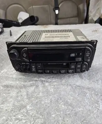 Chrysler PT Cruiser Radio/CD/DVD/GPS head unit P56038585AM MU9CY95G 01739K010
