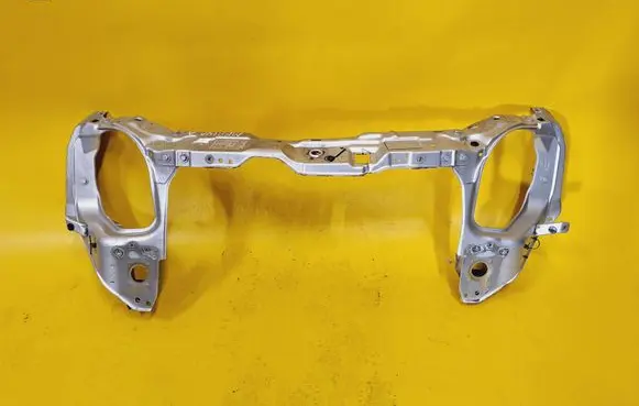 Radiator support slam panel