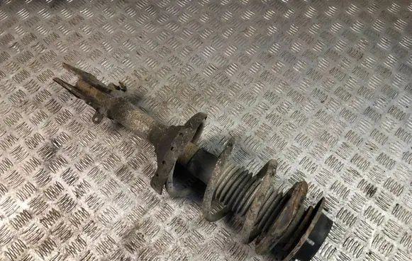 Subaru Outback Front shock absorber with coil spring